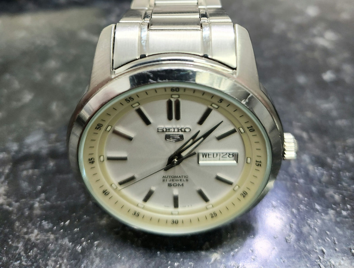 Seiko Mens Automatic Watch with Silver Strap and Silver Dial SNKM83K1