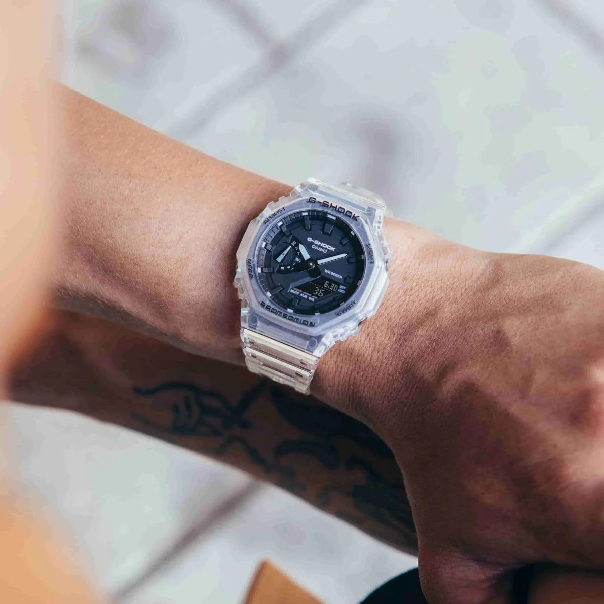 Casio G-Shock Mens Analogue-Digital Watch with Black Dial and Clear Strap GA-2100SKE-7AER