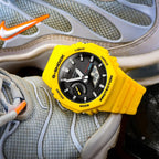 Casio G-Shock Mens Analogue-Digital Watch with Black Dial and Yellow Strap GA-B2100C-9AER