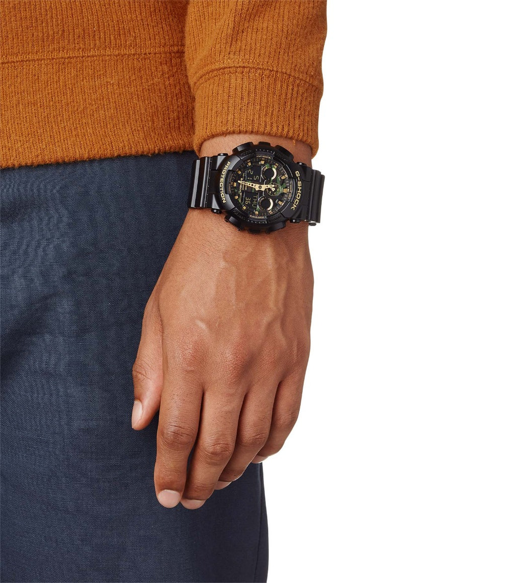 Gwylio Analogaidd-Digidol i Ddynion Casio G-Shock gydag Wyneb Camo a Strap Du GA-100CF-1A9ER