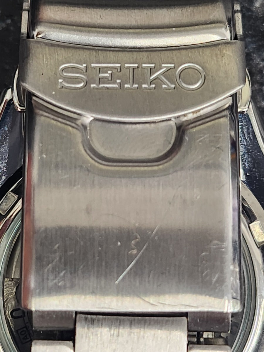 Seiko 5 Men's Automatic Watch with Green Dial and Stainless Steel Strap SRPD63K1
