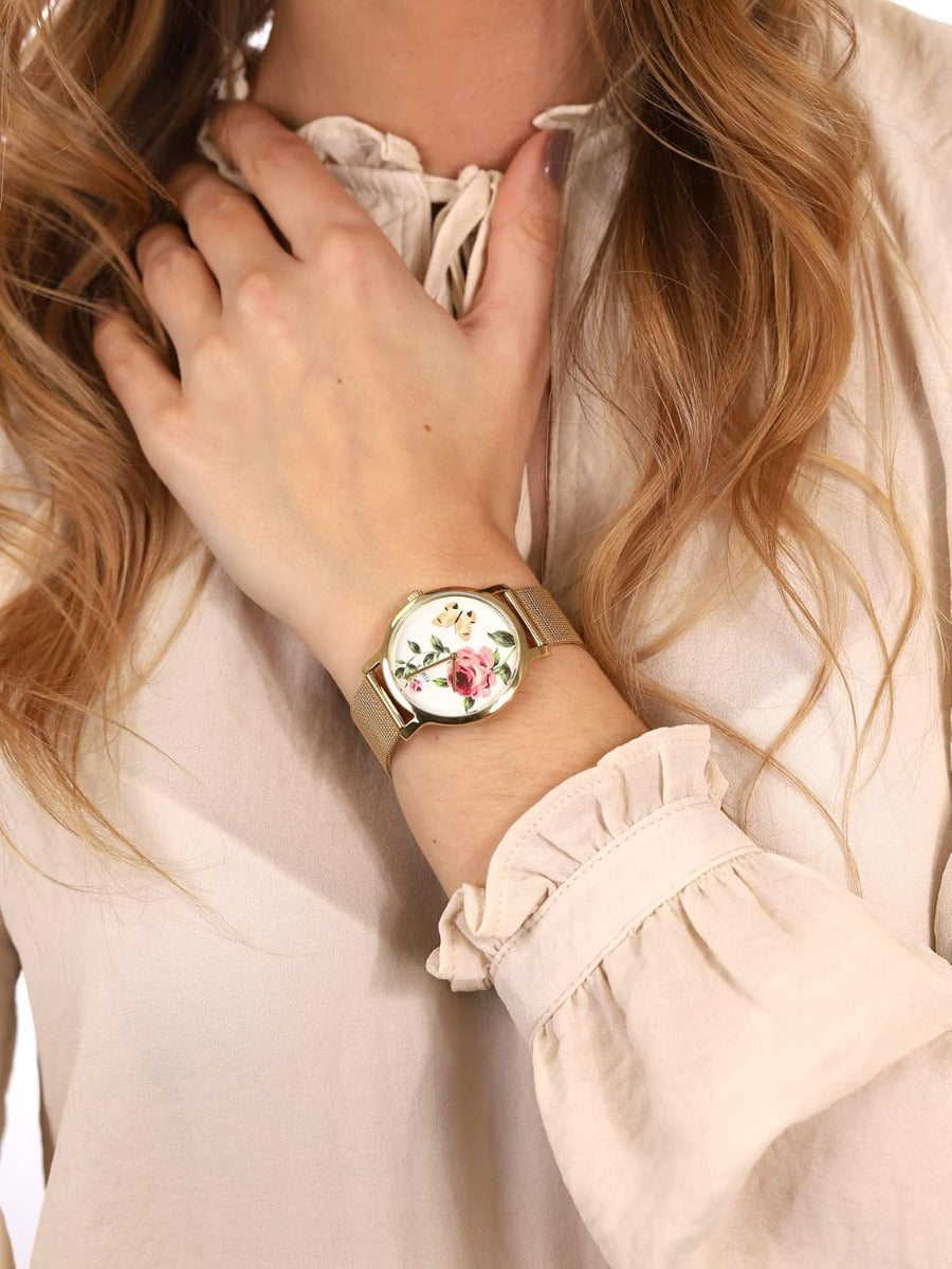 Timex Full Bloom Ladies Watch with Pink Dial and Gold Strap TW2U19100